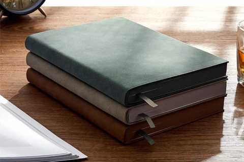 What material is the hardcover notebook cover made of?